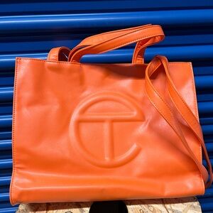 Orange medium Telfar shopping tote bag. Pre owned